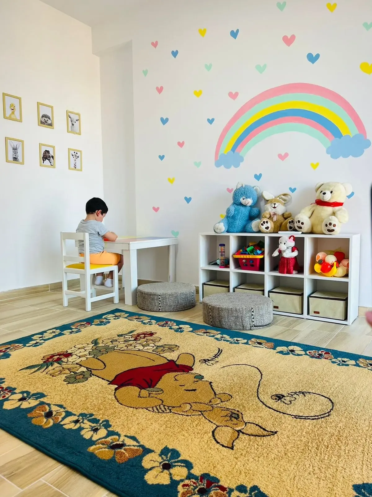 The waiting area with armchairs and children's books